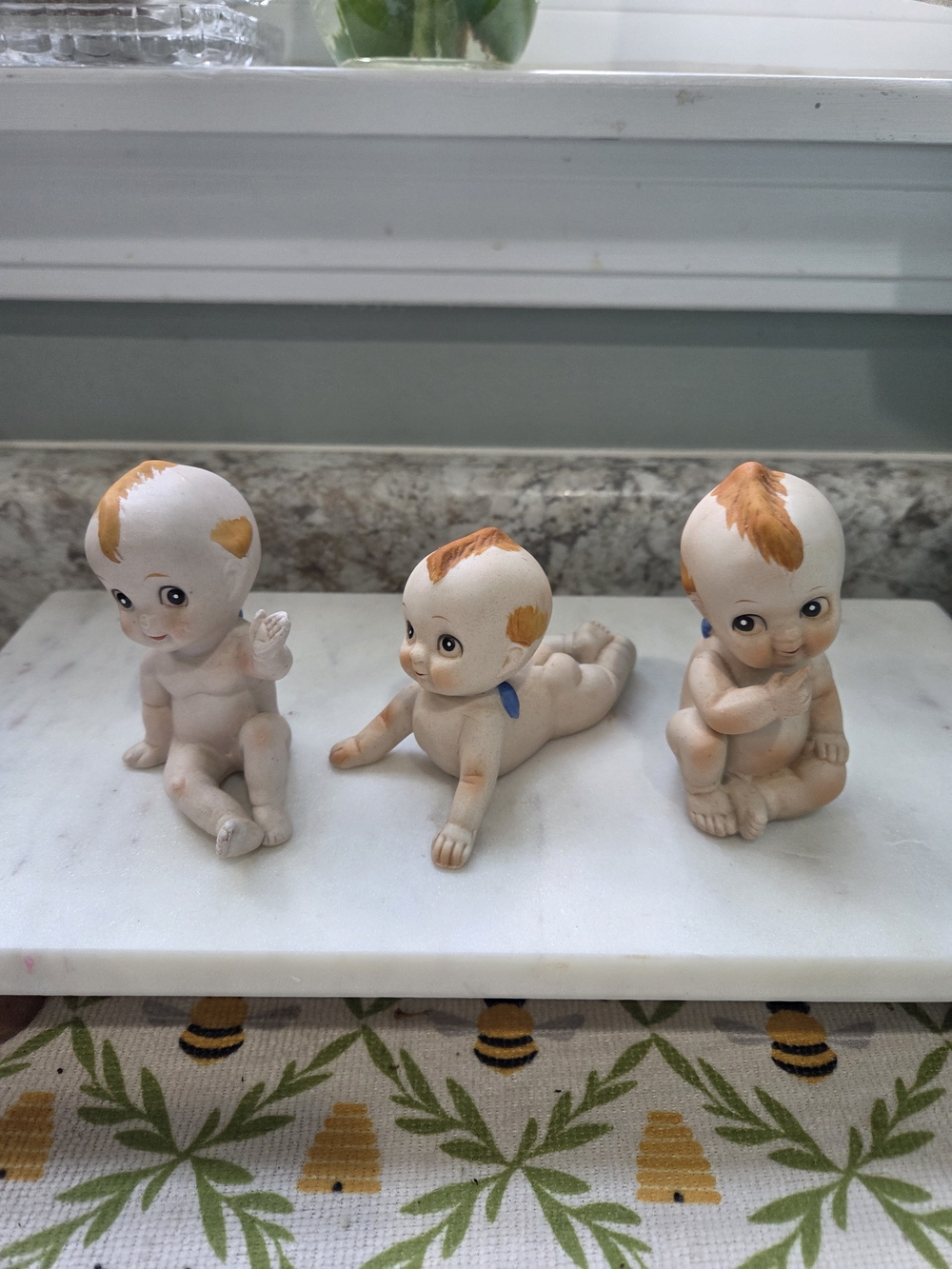 Set of 3 Vintage Ceramic Kewpie-Style Figurines in Cream and Orange